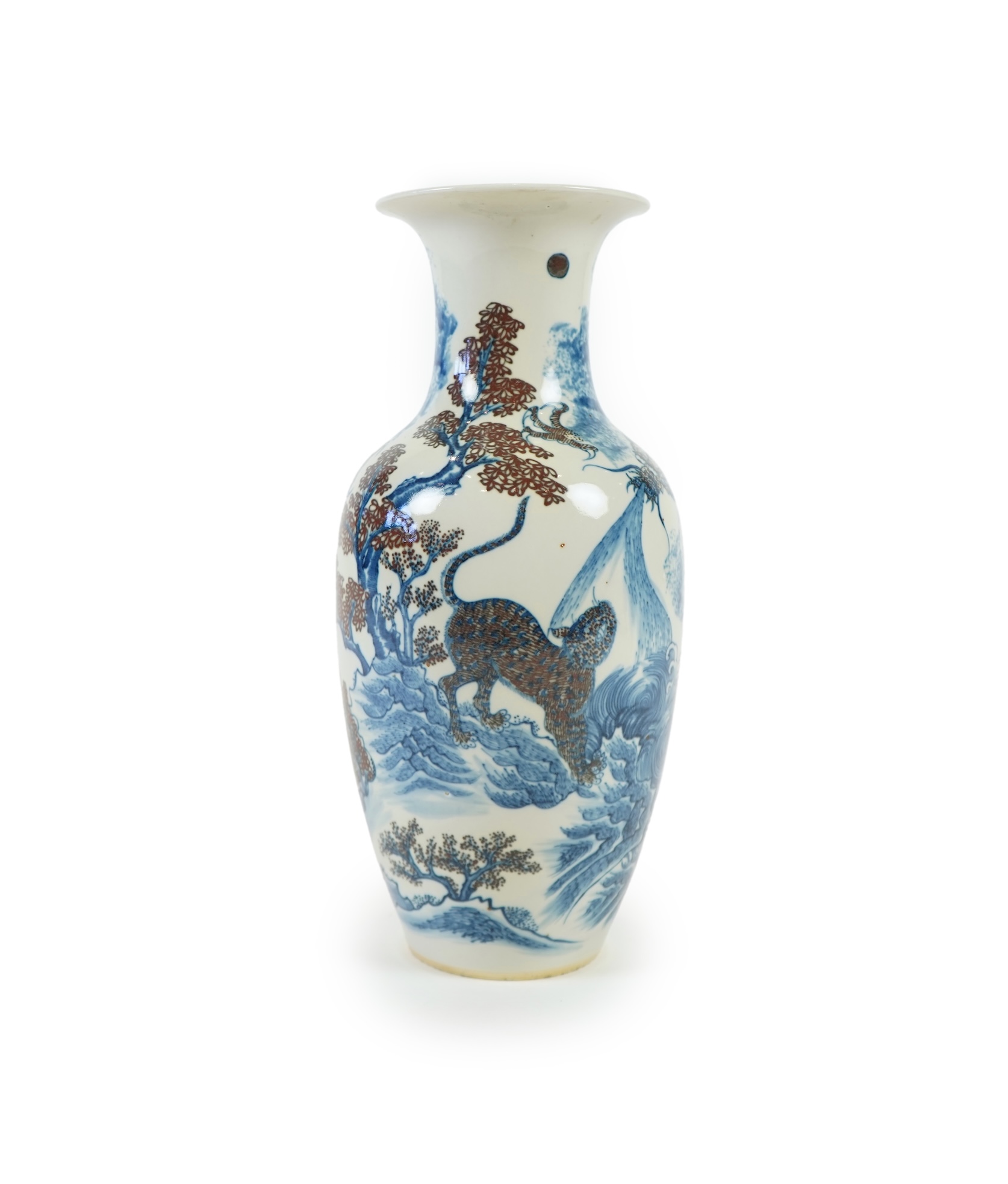 A Chinese underglaze blue and copper red ’dragon and tiger’ baluster vase, possibly 19th century
